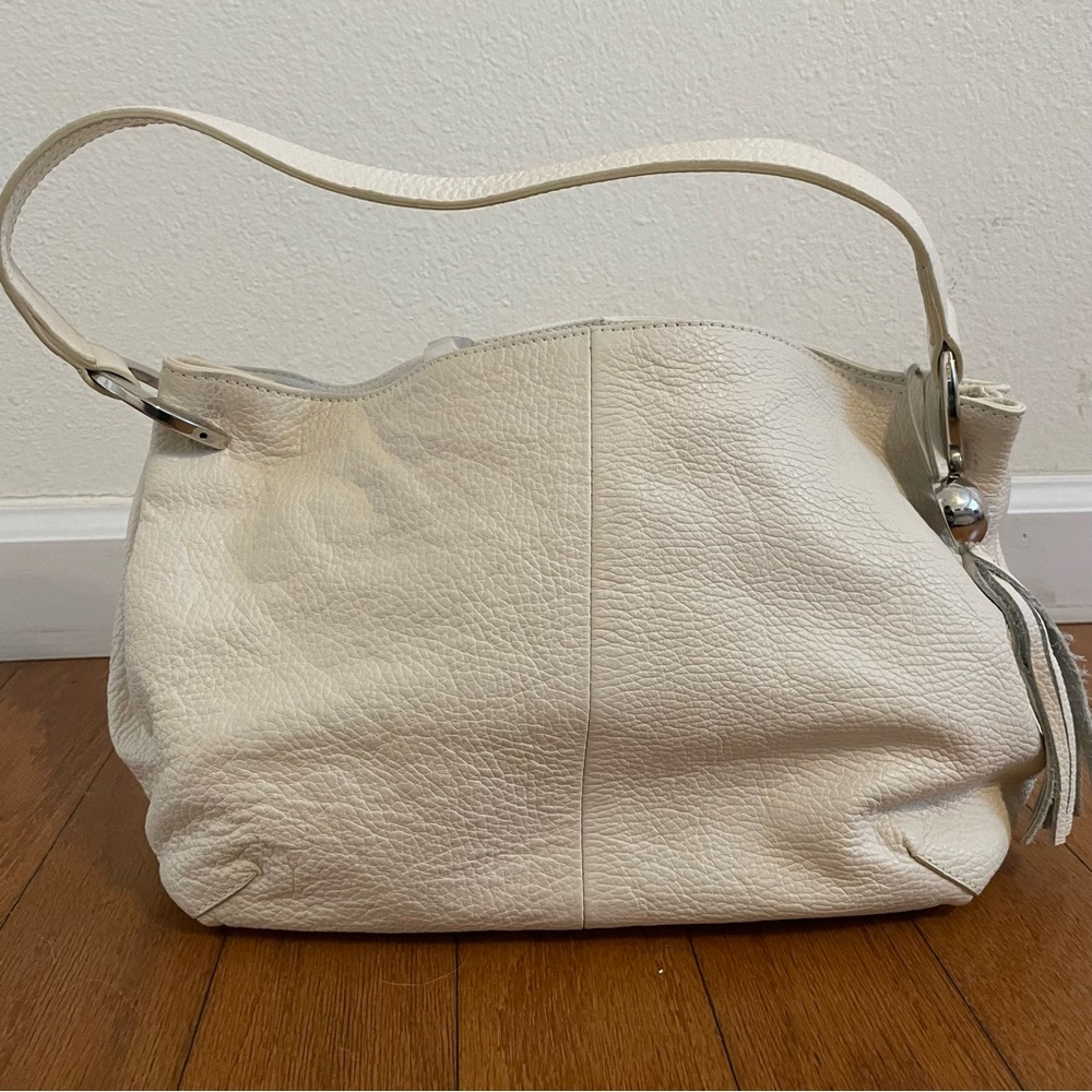 Gorgeous white leather Furla handbag with silver accents. Never used.